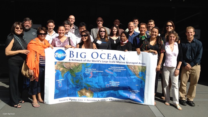 Big Ocean members gathered at the network’s second meeting in 2011, holding a Big Ocean banner.